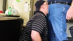 Daddy trucker dumps a quick load in Chubby Boy's mouth...