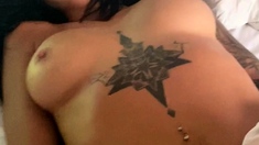 Busty curly brunette with big boobs fucks on couch