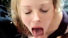 Shooting cum on the cute blonde's tongue and she swallows